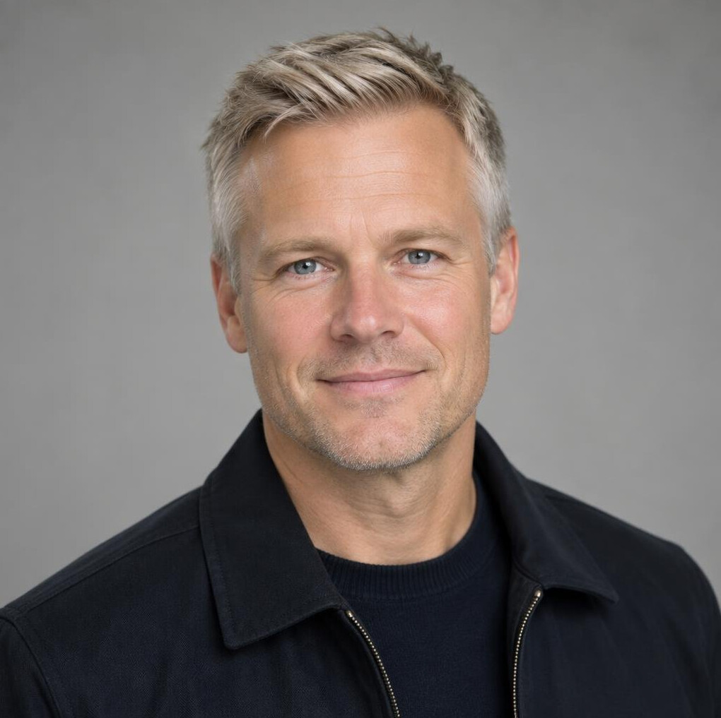 Portrait of a man in a business casual jacket